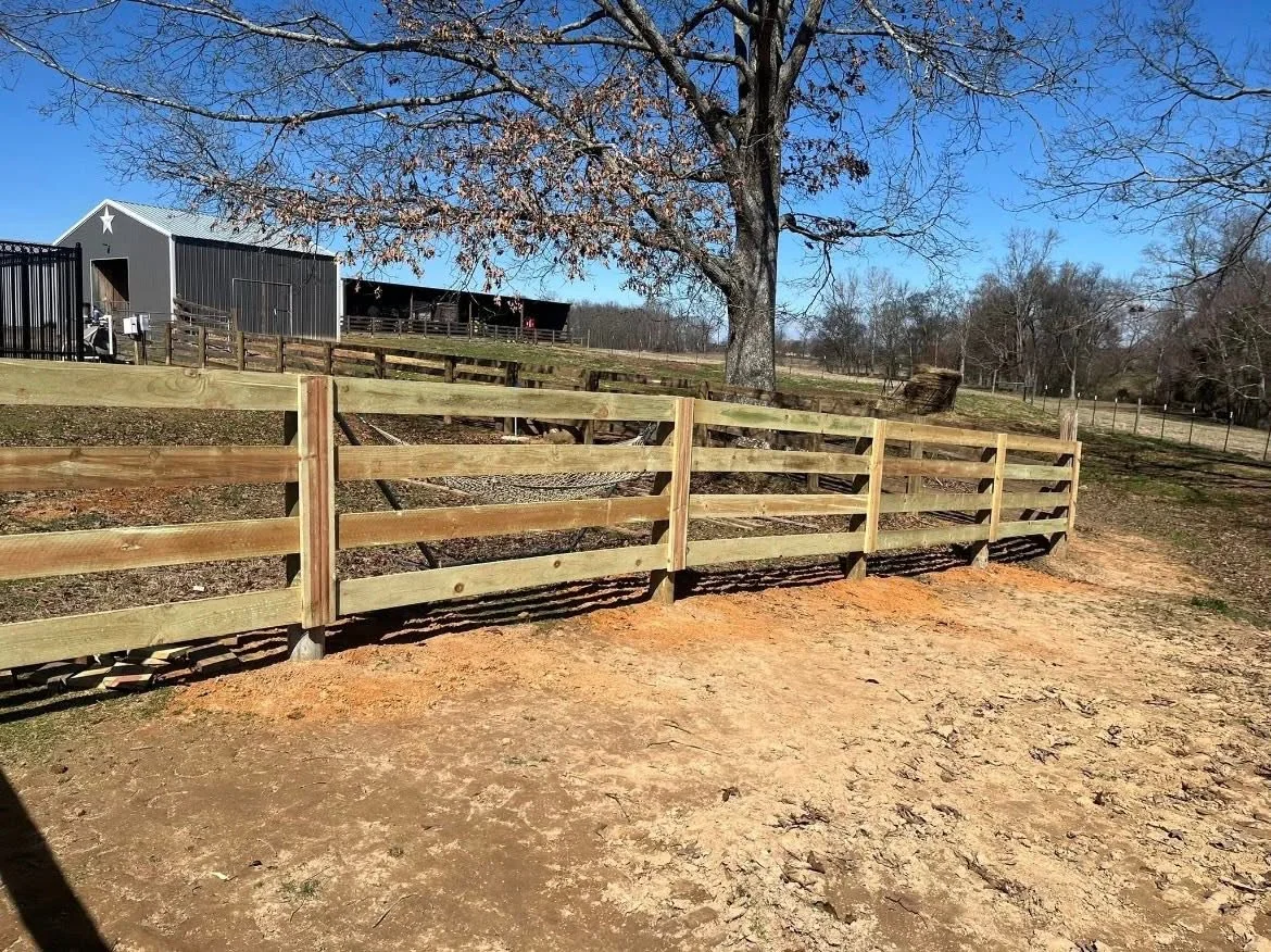 Wooden agricultural fence on a farm
